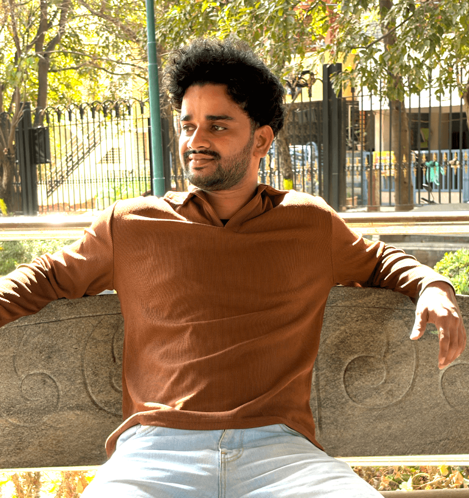 Subrata Mondal, seated outdoors